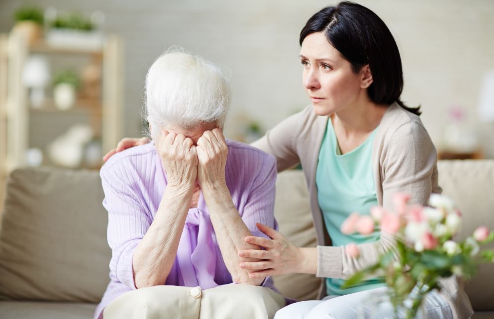 Why do dementia patient suffer from spontaneous crying?